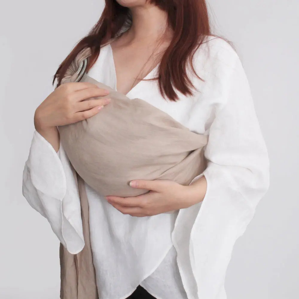 The-Best-Materials-for-Baby-Ring-Sling-A-Comparison Victory Symbol